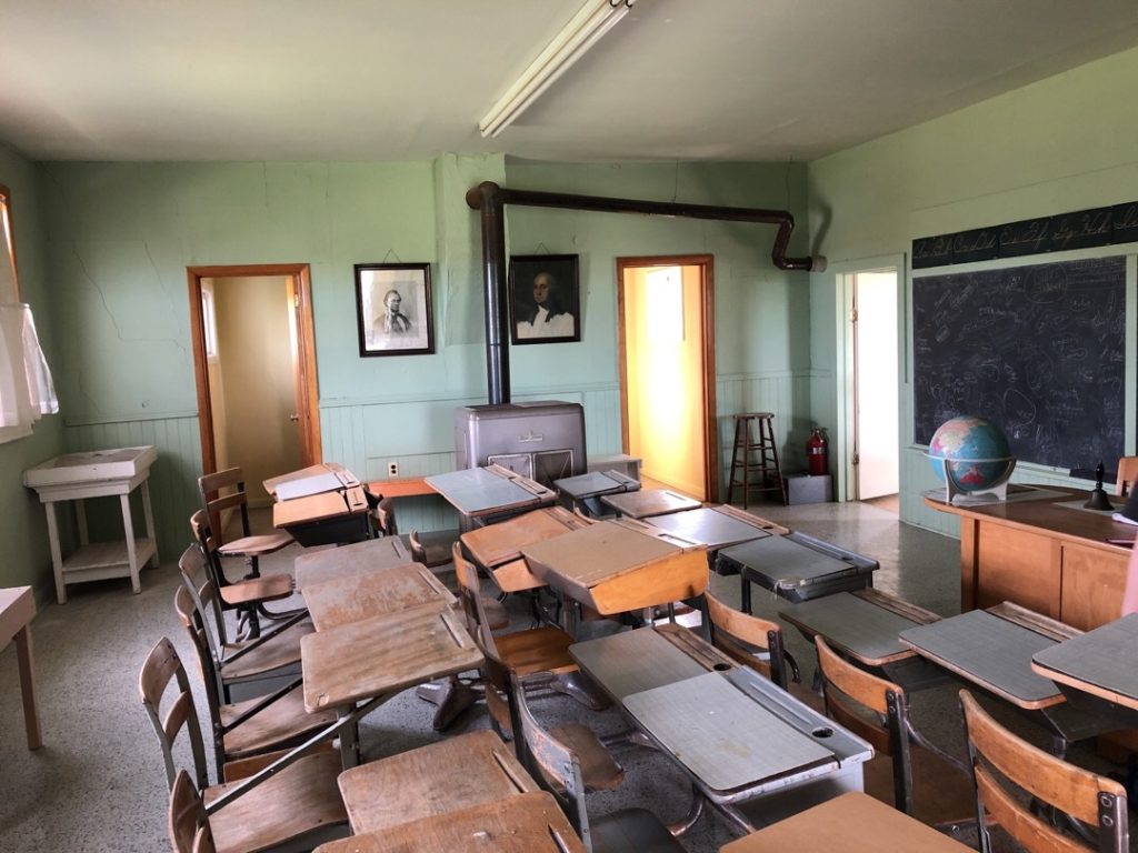 Many schoolhouses are homes to historical exhibits. This one displays a common classroom scene from the turn of the century.