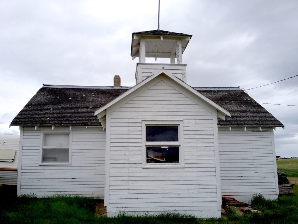 Bell towers are one of the defining features of schoolhouses throughout the West. Although it is missing its bell, this Toole County schoolhouse is a good example of common bell towers.
